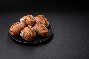 Fresh baked bread buns with salt, spices, seeds and grains