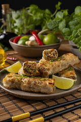 Portion of spring rolls stuffed with meat. Served with sauce. - 788211381