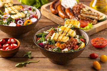 Delicious salad added to grilled dishes, with bacon and halloumi cheese. - 788211919