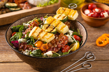 Delicious salad added to grilled dishes, with bacon and halloumi cheese. - 788211932