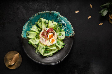 Elegant Olivier Salad with Roast Beef and Fresh Cucumbers on Stylish Plate - 788216165