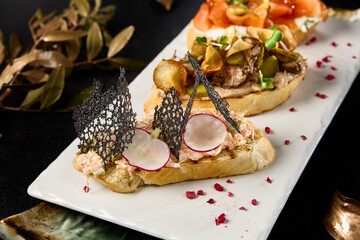 Gourmet Bruschetta Assortment: Crab, Salmon with Avocado, and Roast Beef Delicacies on Elegant Dining Table - 788216181