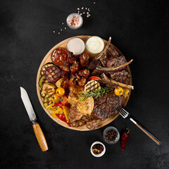 Diverse Grilled Meat and Vegetable Platter with BBQ Ribs, Lamb, Beef, Turkey, and Chicken - 788217192