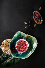 Exquisite Pavlova Dessert with Fresh Raspberries on Elegant Plate - 788217725