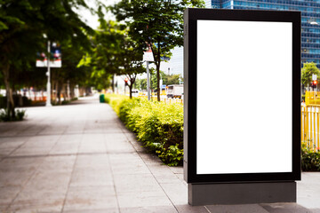 Advertising Outdoor City Light Poster on Blank Vertical Billboard in the City