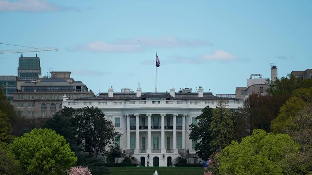 The oval office at the White House in Washington, DC, office of the president of the United States on a bright spring day with blue sky.