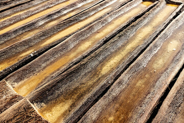 Wooden trays for the sea salt production in Amed, Bali