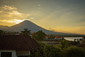 Breathtaking sunset view on Agung volcano from Amed beach in Bali, Indonesia