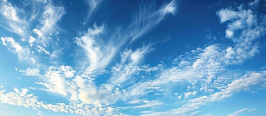 Delicate clouds in the azure sky - obrazy, fototapety, plakaty