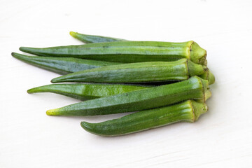 Fresh green okra isolated on white background. Healthy vegetables.
