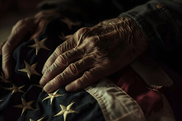 senior man grasping an american flag