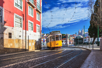 Lisbon city old town and famous yellow tram 28. Lisbon, Portugal. 