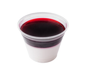 Layered berry panna cotta in plastic cup isolated on white