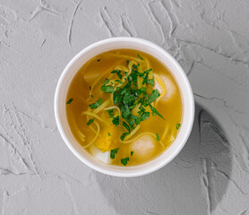 Fresh homemade chicken noodle soup in bowl