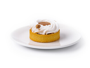 Elegant vanilla cream tart on white plate