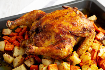 Homemade Hearty Roasted Chicken on a Tray, side view. - 788247157