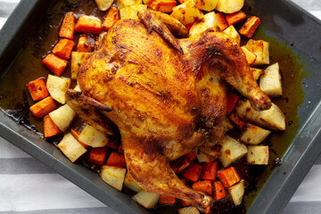 Homemade Hearty Roasted Chicken on Tray, top view. - 788248308