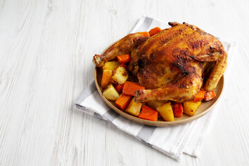Homemade Hearty Roasted Chicken on a Plate, side view. Space for text. - 788248907