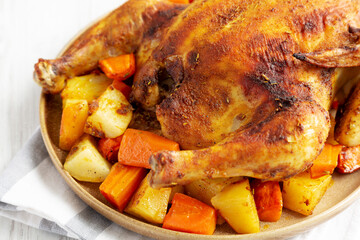 Homemade Hearty Roasted Chicken on a Plate, side view. Close-up. - 788249123