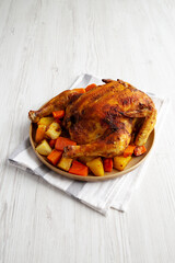 Homemade Hearty Roasted Chicken on a Plate, side view. Close-up. - 788249175