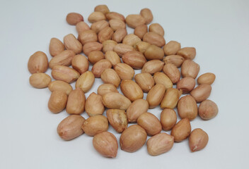 Pile of  raw peanut isolated on white background