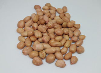 Pile of  raw peanut isolated on white background