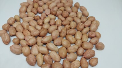 Pile of  raw peanut isolated on white background