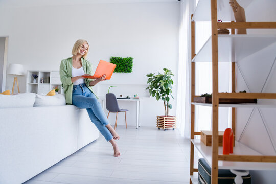 Photo of lovely cheerful woman professional office manager consultant working remotely indoors