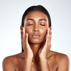 Studio, face and beauty with Indian woman, hands and cosmetic or makeup. Cosmetology, skin or...