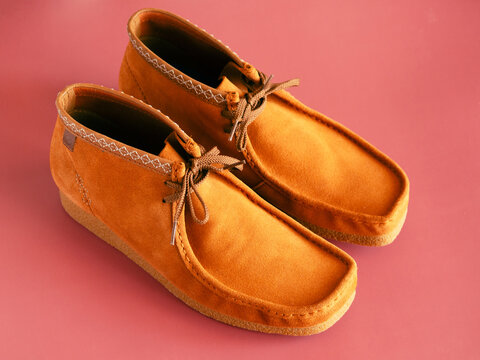 moscow russia 08 06 2023. stylish men's suede boots Clarks Wallabee..