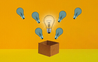 Think outside the box. Concept idea about Business for innovation and inspiration. Different Light bulbs glowing the different creative idea