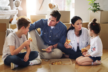 Parents, children and pizza or moving boxes in new home for unpacking break, fast food or bonding. Mother, father and siblings eating of floor or real estate purchase for mortgage, family or property - obrazy, fototapety, plakaty