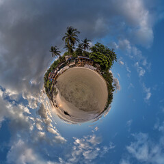 coconut trees in jungle in Indian tropic village on sea shore on little planet in blue sky, transformation of spherical 360 panorama. Spherical abstract view with curvature of space. - 788277505
