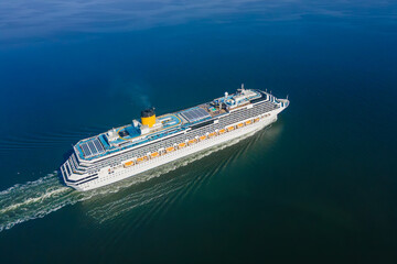 Aerial view of cruise ship in sea. Cruise liner sailing the ocean or sea on a sunny summer day