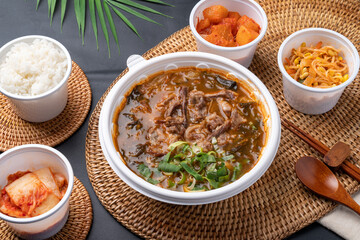 Korean food, Korean beef, beef sashimi,  beef sashimi, raw pork belly, charcoal fire, seasoning, ribs, side dishes, galbitang, rice, kimchi, ssamjang, chili peppers, garlic, radish sprouts, lettuce
