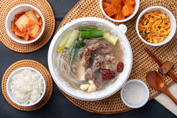 Korean food, Korean beef, beef sashimi,  beef sashimi, raw pork belly, charcoal fire, seasoning, ribs, side dishes, galbitang, rice, kimchi, ssamjang, chili peppers, garlic, radish sprouts, lettuce