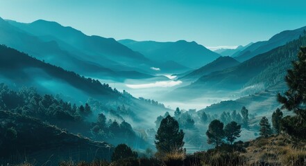 A misty mountain valley bathed in soft morning light
