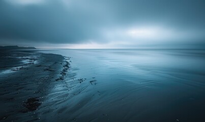 Fototapeta premium A serene coastal landscape with soft morning hues illuminating the shoreline