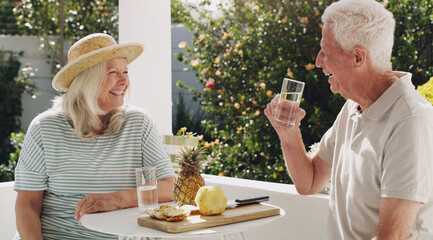 Senior, couple or relax on patio with water for retirement, planning vacation for anniversary....
