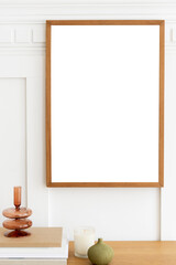 Wooden picture frame mockup over a wooden table