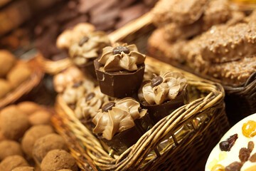 Chocolate truffle balls on market counter