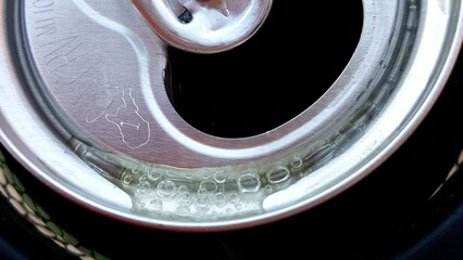 Soda Bubbles on Metal, Top of Open Soda Can 