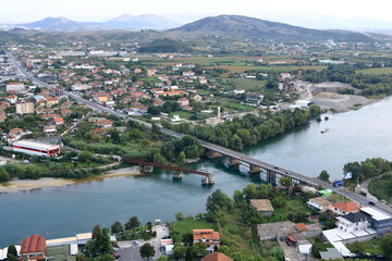 Naklejka premium View of a valley with a rural settlement from the ancient stone wall of Rozafa Castle in Shkoder, Albania