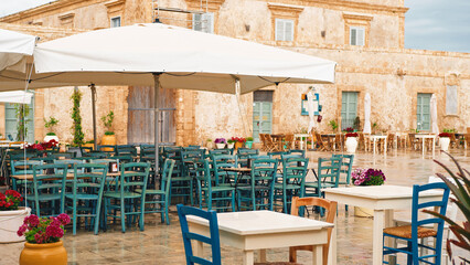 Marzamemi typical restaurant outdoor in the square of Sicily