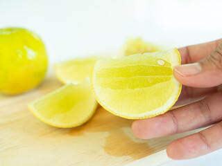 Slice Lemon Fruit, Shef Cutting Lime Cooking in Kitchen Restaurant, Raw Food Citrus for Juicy or...