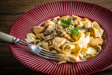 Tagliatelle pasta with forest mushrooms and chicken. - 788372732