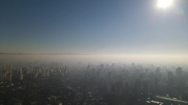 Aerial view of SAO PAULO city, cloudy morning with fogs, drone shot, 
This image is perfect for projects related to events, travel and tourism.