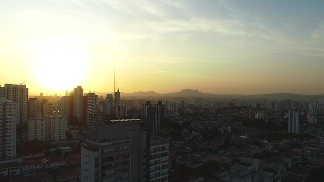 Aerial view of SAO PAULO city, sunset city, drone shot, 
This image is perfect for projects related to events, travel and tourism.