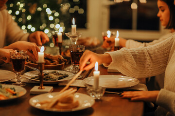 Happy large family with many children celebrating Christmas or New Year eve together at cozy warm home