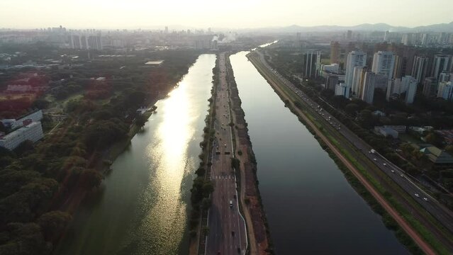 Aerial view of Marginal Pinheiros in S&atilde;o Paulo city, Sunset drone shot, This image is perfect for projects related to events, travel, journalism, real estate